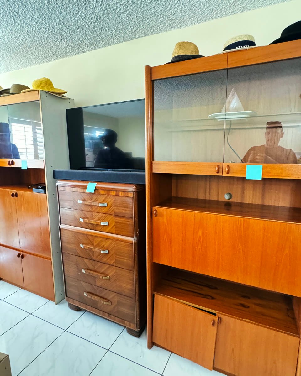 Old wall units and dressers ready to be hauled away
